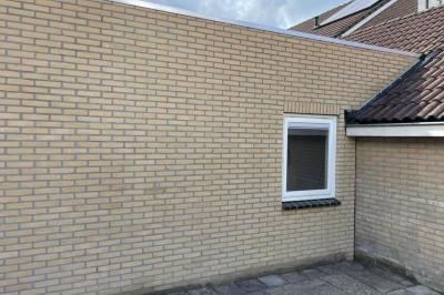 Aanbouw met bad- en slaapkamer